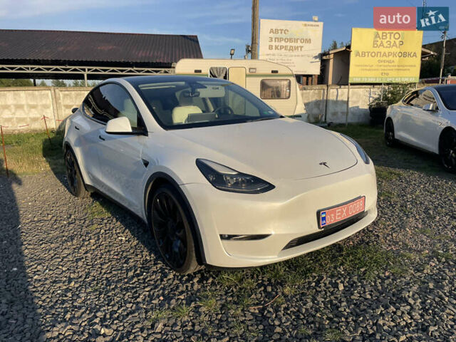 Белый Тесла Model Y, объемом двигателя 0 л и пробегом 52 тыс. км за 25900 $, фото 1 на Automoto.ua
