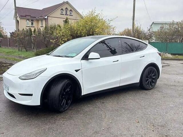 Белый Тесла Model Y, объемом двигателя 0 л и пробегом 125 тыс. км за 22000 $, фото 1 на Automoto.ua