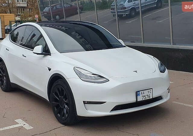 Білий Тесла Model Y, об'ємом двигуна 0 л та пробігом 88 тис. км за 21100 $, фото 1 на Automoto.ua