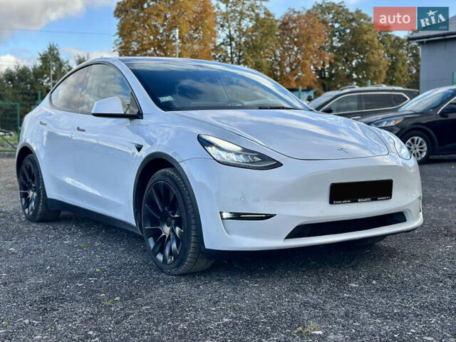 Белый Тесла Model Y, объемом двигателя 0 л и пробегом 66 тыс. км за 26000 $, фото 1 на Automoto.ua