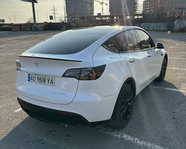 Белый Тесла Model Y, объемом двигателя 0 л и пробегом 140 тыс. км за 20899 $, фото 1 на Automoto.ua
