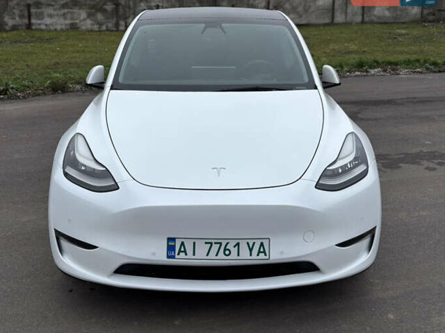 Білий Тесла Model Y, об'ємом двигуна 0 л та пробігом 83 тис. км за 22200 $, фото 1 на Automoto.ua