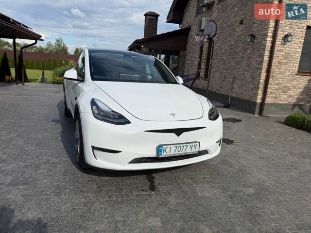 Белый Тесла Model Y, объемом двигателя 0 л и пробегом 75 тыс. км за 30000 $, фото 1 на Automoto.ua