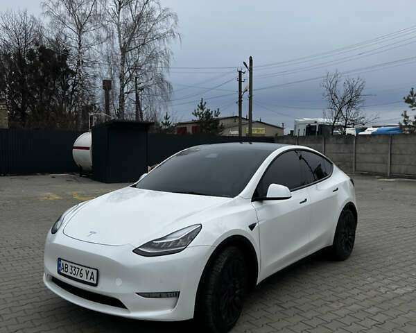 Белый Тесла Model Y, объемом двигателя 0 л и пробегом 95 тыс. км за 23500 $, фото 1 на Automoto.ua
