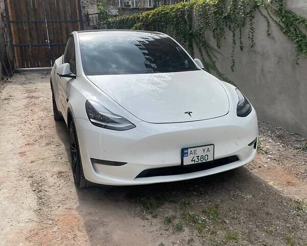 Білий Тесла Model Y, об'ємом двигуна 0 л та пробігом 76 тис. км за 20800 $, фото 1 на Automoto.ua