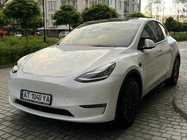 Білий Тесла Model Y, об'ємом двигуна 0 л та пробігом 88 тис. км за 29900 $, фото 1 на Automoto.ua