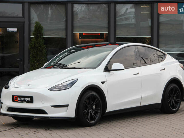 Белый Тесла Model Y, объемом двигателя 0 л и пробегом 51 тыс. км за 23000 $, фото 1 на Automoto.ua