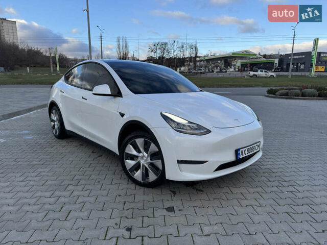 Білий Тесла Model Y, об'ємом двигуна 0 л та пробігом 83 тис. км за 24500 $, фото 1 на Automoto.ua