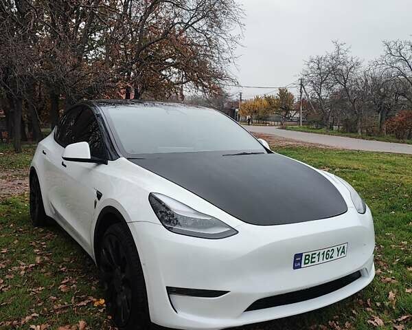 Белый Тесла Model Y, объемом двигателя 0 л и пробегом 59 тыс. км за 25999 $, фото 1 на Automoto.ua