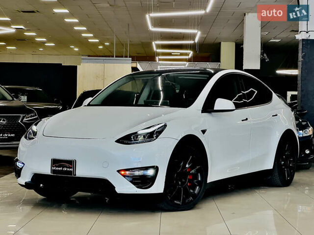 Білий Тесла Model Y, об'ємом двигуна 0 л та пробігом 74 тис. км за 24999 $, фото 1 на Automoto.ua