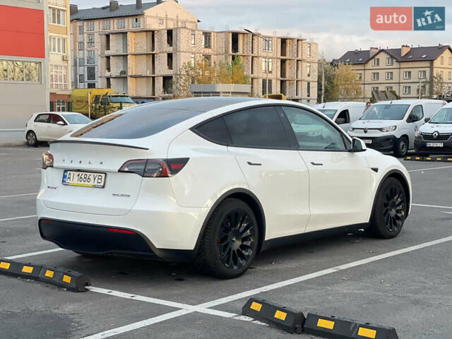 Белый Тесла Model Y, объемом двигателя 0 л и пробегом 117 тыс. км за 23200 $, фото 1 на Automoto.ua