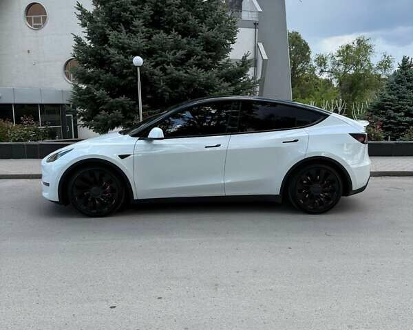 Белый Тесла Model Y, объемом двигателя 0 л и пробегом 90 тыс. км за 27500 $, фото 1 на Automoto.ua