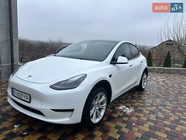 Белый Тесла Model Y, объемом двигателя 0 л и пробегом 94 тыс. км за 29999 $, фото 1 на Automoto.ua