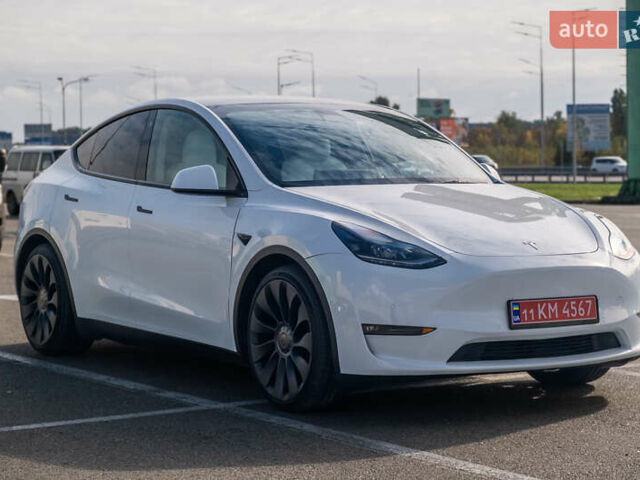 Белый Тесла Model Y, объемом двигателя 0 л и пробегом 51 тыс. км за 29500 $, фото 1 на Automoto.ua