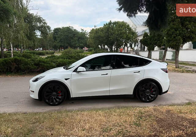 Білий Тесла Model Y, об'ємом двигуна 0 л та пробігом 80 тис. км за 33000 $, фото 1 на Automoto.ua