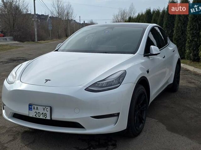 Белый Тесла Model Y, объемом двигателя 0 л и пробегом 18 тыс. км за 30999 $, фото 1 на Automoto.ua