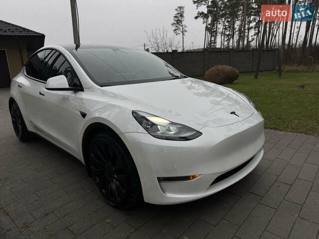 Белый Тесла Model Y, объемом двигателя 0 л и пробегом 74 тыс. км за 25700 $, фото 1 на Automoto.ua