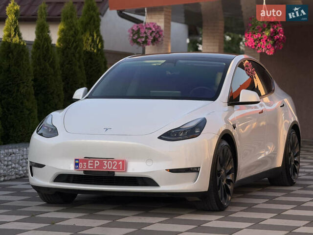 Белый Тесла Model Y, объемом двигателя 0 л и пробегом 59 тыс. км за 28950 $, фото 1 на Automoto.ua