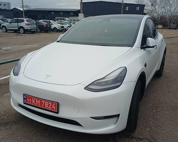 Белый Тесла Model Y, объемом двигателя 0 л и пробегом 54 тыс. км за 30000 $, фото 1 на Automoto.ua