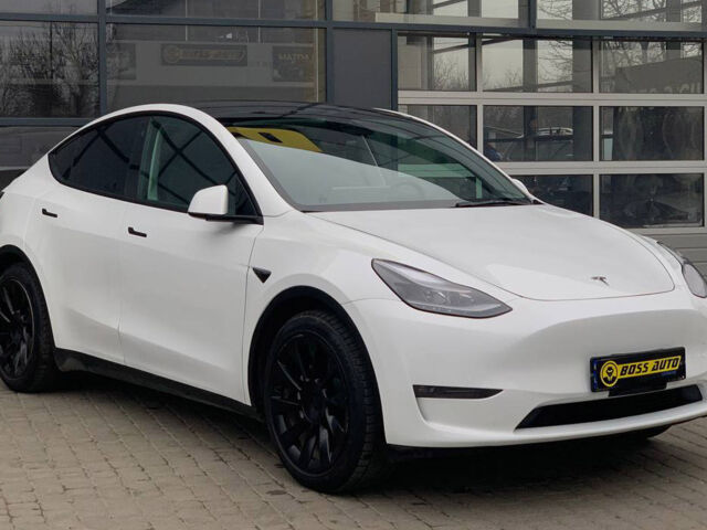 Белый Тесла Model Y, объемом двигателя 82 л и пробегом 15 тыс. км за 33000 $, фото 1 на Automoto.ua