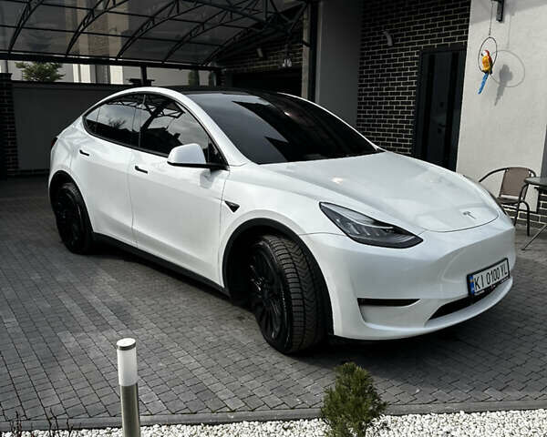 Белый Тесла Model Y, объемом двигателя 0 л и пробегом 55 тыс. км за 25900 $, фото 1 на Automoto.ua