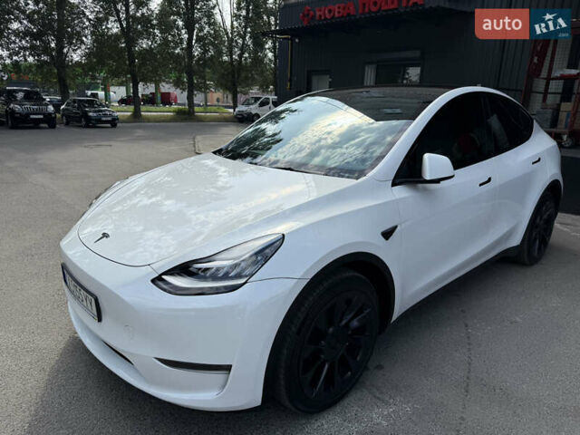 Белый Тесла Model Y, объемом двигателя 0 л и пробегом 38 тыс. км за 29900 $, фото 1 на Automoto.ua
