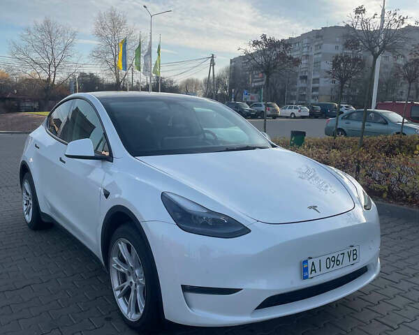 Білий Тесла Model Y, об'ємом двигуна 0 л та пробігом 60 тис. км за 24900 $, фото 1 на Automoto.ua