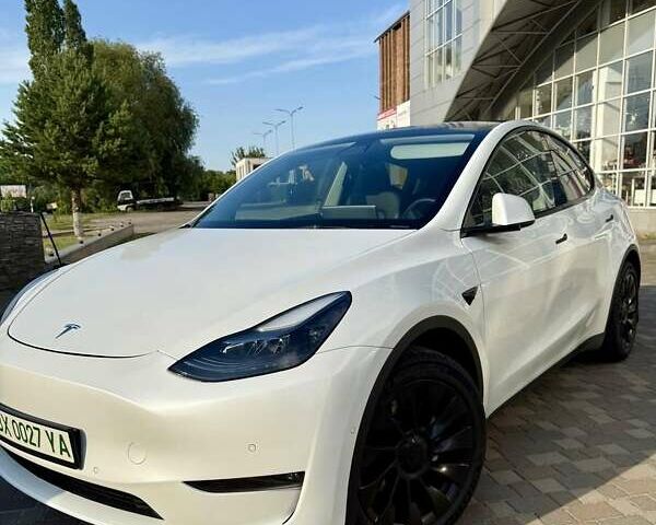 Белый Тесла Model Y, объемом двигателя 0 л и пробегом 23 тыс. км за 33777 $, фото 1 на Automoto.ua