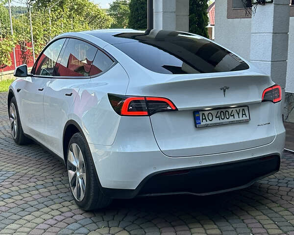 Белый Тесла Model Y, объемом двигателя 0 л и пробегом 129 тыс. км за 36499 $, фото 1 на Automoto.ua