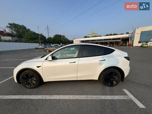 Белый Тесла Model Y, объемом двигателя 0 л и пробегом 79 тыс. км за 28000 $, фото 1 на Automoto.ua