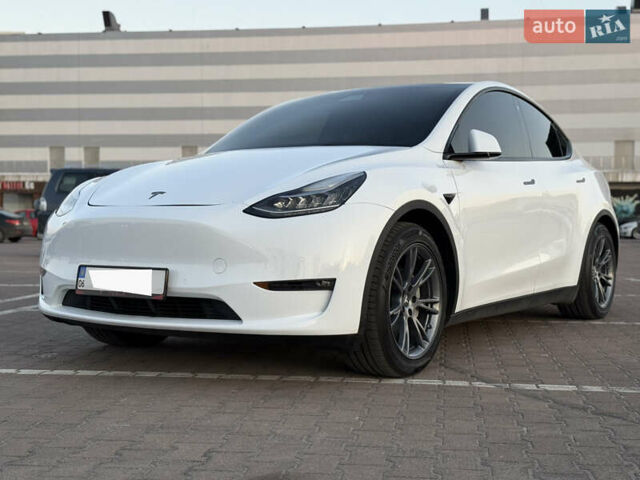 Белый Тесла Model Y, объемом двигателя 0 л и пробегом 58 тыс. км за 25555 $, фото 1 на Automoto.ua