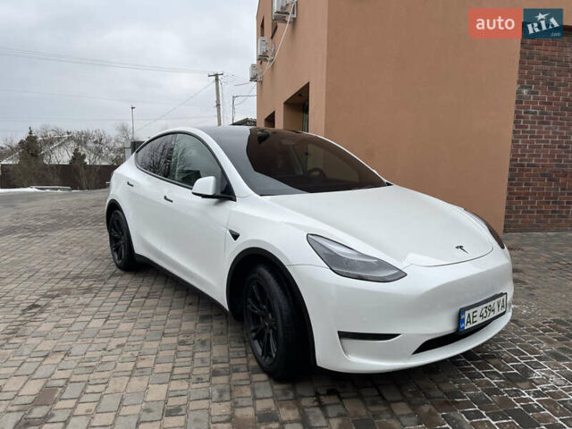 Белый Тесла Model Y, объемом двигателя 0 л и пробегом 56 тыс. км за 35000 $, фото 1 на Automoto.ua
