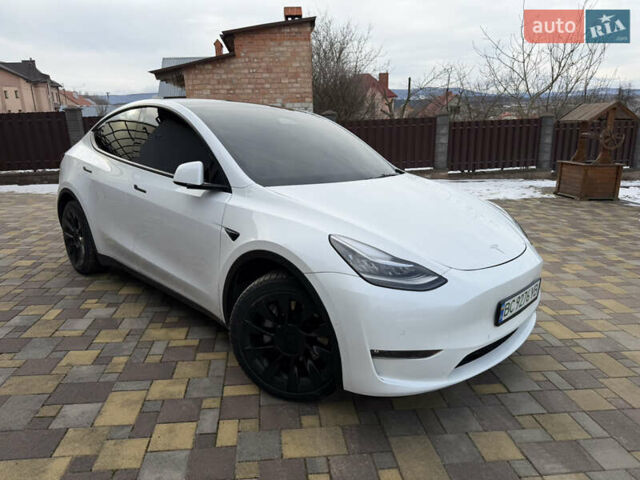 Білий Тесла Model Y, об'ємом двигуна 0 л та пробігом 59 тис. км за 24999 $, фото 1 на Automoto.ua