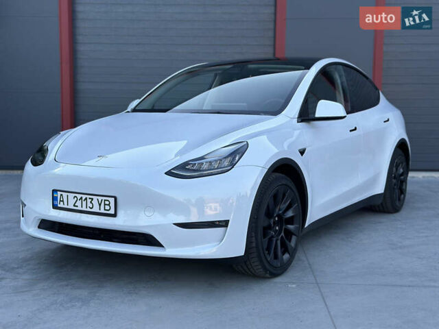 Белый Тесла Model Y, объемом двигателя 0 л и пробегом 55 тыс. км за 23900 $, фото 1 на Automoto.ua
