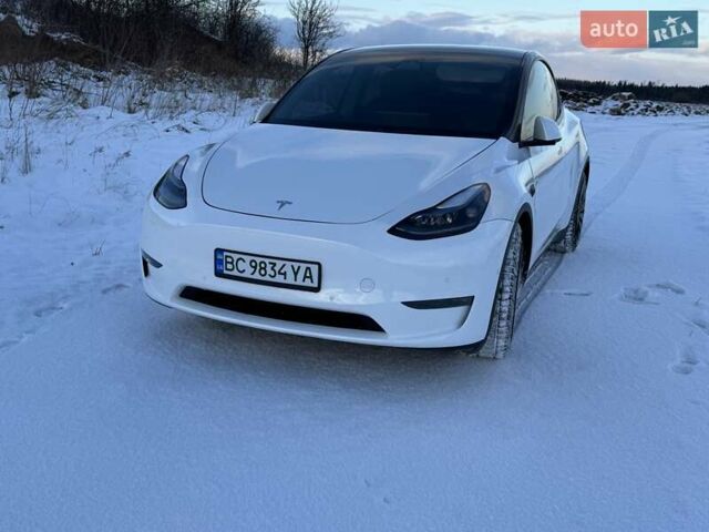 Белый Тесла Model Y, объемом двигателя 0 л и пробегом 33 тыс. км за 25600 $, фото 1 на Automoto.ua