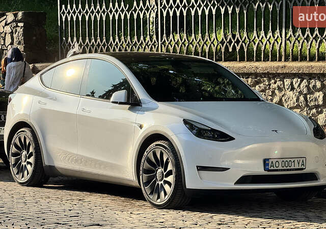 Белый Тесла Model Y, объемом двигателя 0 л и пробегом 90 тыс. км за 34999 $, фото 1 на Automoto.ua