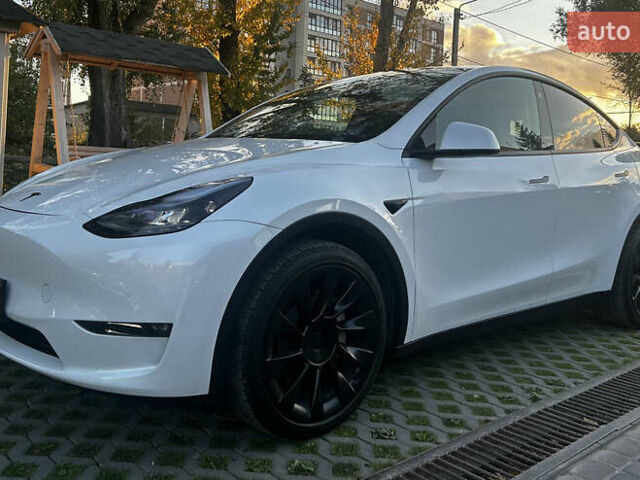 Белый Тесла Model Y, объемом двигателя 0 л и пробегом 25 тыс. км за 28500 $, фото 1 на Automoto.ua