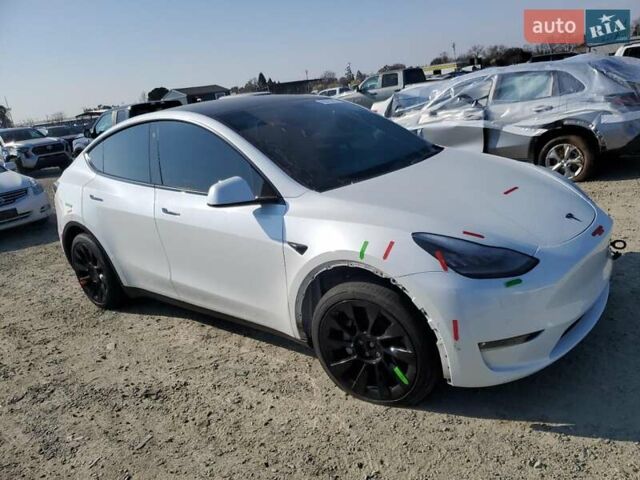 Белый Тесла Model Y, объемом двигателя 0 л и пробегом 64 тыс. км за 14200 $, фото 1 на Automoto.ua