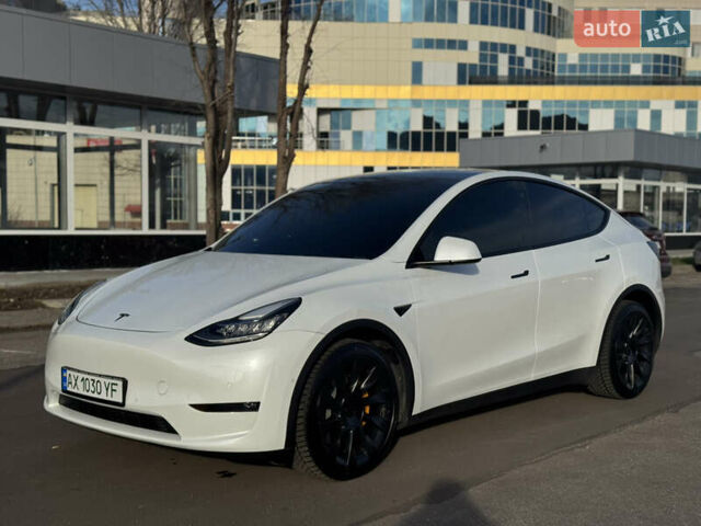 Білий Тесла Model Y, об'ємом двигуна 0 л та пробігом 53 тис. км за 28000 $, фото 1 на Automoto.ua