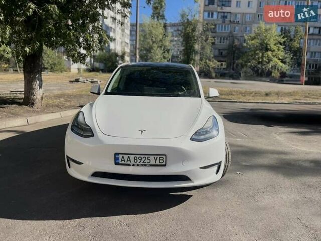 Белый Тесла Model Y, объемом двигателя 0 л и пробегом 55 тыс. км за 28000 $, фото 1 на Automoto.ua