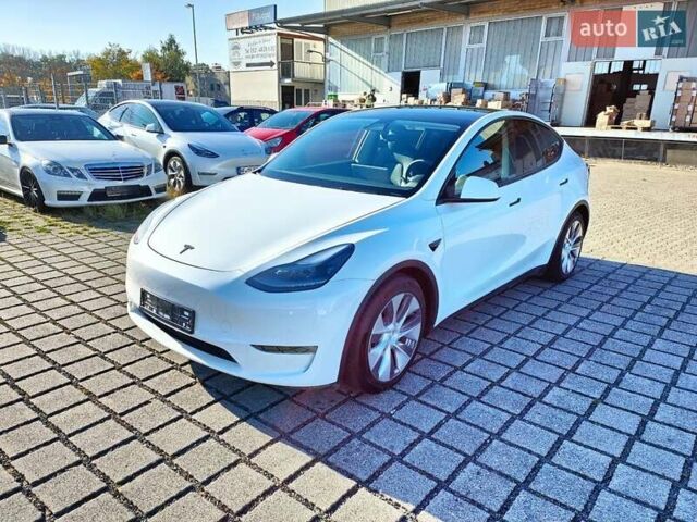 Белый Тесла Model Y, объемом двигателя 0 л и пробегом 67 тыс. км за 28300 $, фото 1 на Automoto.ua