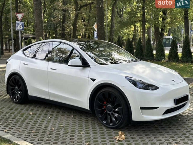 Белый Тесла Model Y, объемом двигателя 0 л и пробегом 49 тыс. км за 35000 $, фото 1 на Automoto.ua