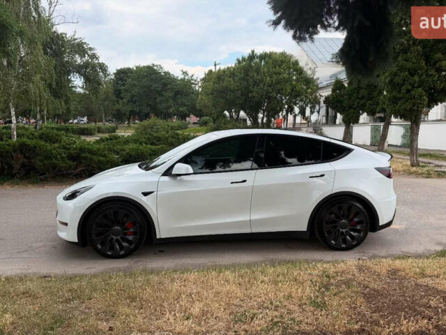 Білий Тесла Model Y, об'ємом двигуна 0 л та пробігом 80 тис. км за 33000 $, фото 1 на Automoto.ua