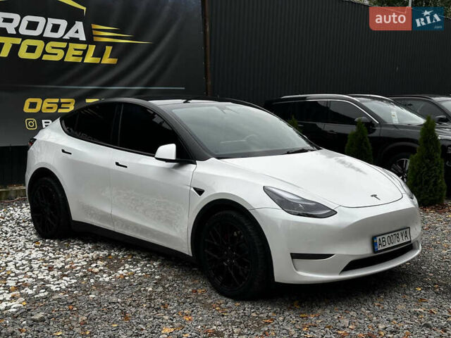 Белый Тесла Model Y, объемом двигателя 0 л и пробегом 57 тыс. км за 32000 $, фото 1 на Automoto.ua
