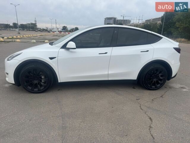 Белый Тесла Model Y, объемом двигателя 0 л и пробегом 77 тыс. км за 26900 $, фото 1 на Automoto.ua