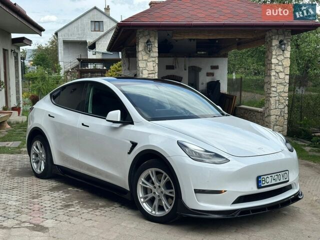 Белый Тесла Model Y, объемом двигателя 0 л и пробегом 69 тыс. км за 23700 $, фото 1 на Automoto.ua