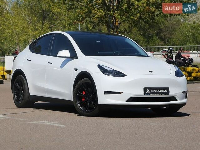Белый Тесла Model Y, объемом двигателя 0 л и пробегом 90 тыс. км за 28100 $, фото 1 на Automoto.ua