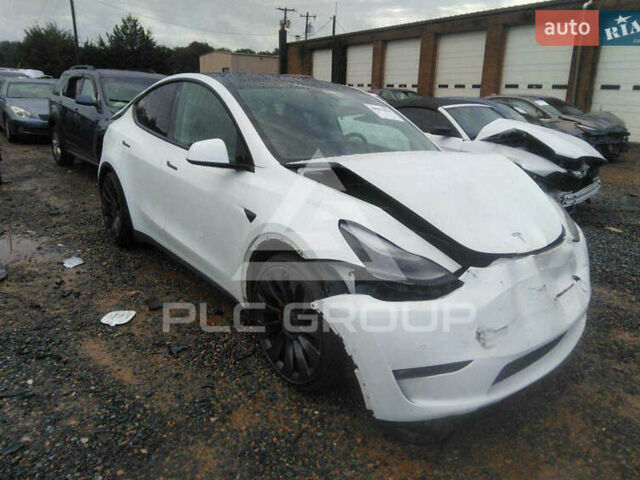Белый Тесла Model Y, объемом двигателя 0 л и пробегом 88 тыс. км за 21300 $, фото 1 на Automoto.ua