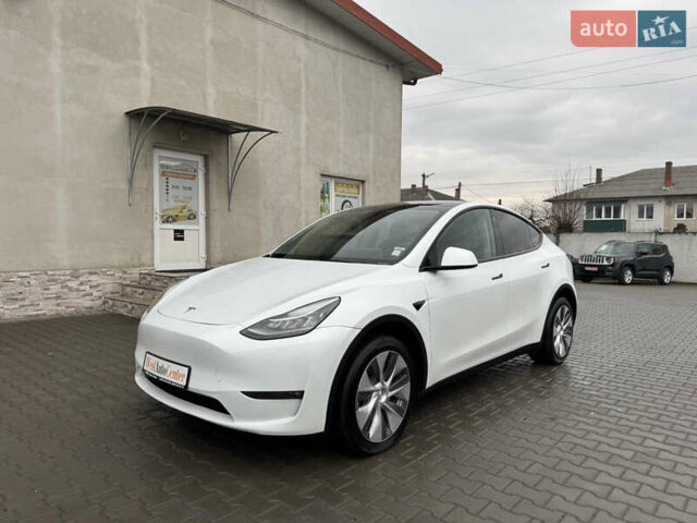 Білий Тесла Model Y, об'ємом двигуна 0 л та пробігом 37 тис. км за 25500 $, фото 1 на Automoto.ua