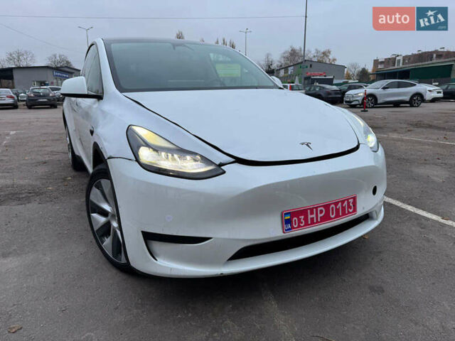 Білий Тесла Model Y, об'ємом двигуна 0 л та пробігом 50 тис. км за 21900 $, фото 1 на Automoto.ua